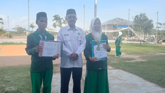 MAN 2 Tanjung Jabung Timur Berjaya: Borong Medali Emas Biologi dan Juara Vocal Solo